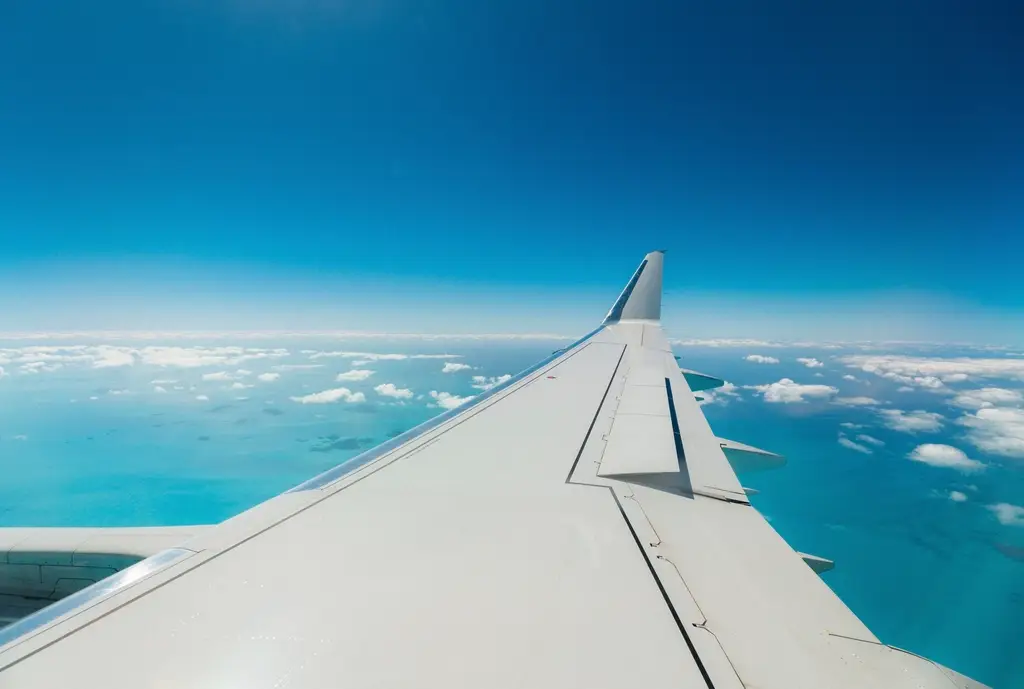 Wing an airplane mid air